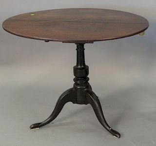 Queen Anne mahogany bird cage tip top tea table on turned shaft and pad feet. dia. 36in.