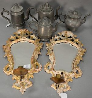 Group lot to include pair of sconces with wood frames (ht. 20in.), bevel mirror, and four primitive pewter tea and coffee pot