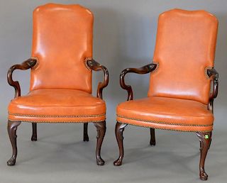 Pair of Queen Anne armchairs with leather upholstery.