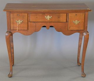 Queen Anne cherry three drawer dressing table made up of old parts. ht. 33 1/2in., lg. 40in.
