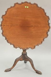 Georgian mahogany pie crust tip table with carved base, 18th century. dia. 32in.
