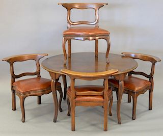 Five piece lot including Louis XV style table and four leather upholstered chairs. table: ht. 25in., dia. 46in.