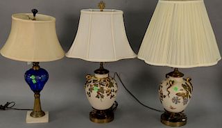 Five piece group, four table lamps including pair of snake lamps and a porcelain figural compote (repaired). compote