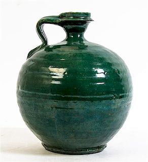 A Green Glazed Water Vessel, Height 10 1/4 inches.