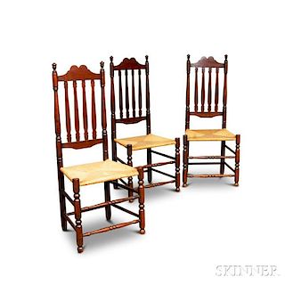 Three Bannister-back Woven Rush Seat Side Chairs.