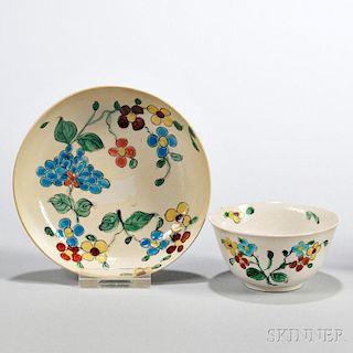 White Salt-glazed Stoneware Polychrome Enamel-decorated Tea Bowl and Saucer