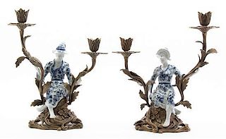 A Pair of Louis XV Style Gilt Metal and Porcelain Two-Light Candelabra, Height 12 x width 11 inches.