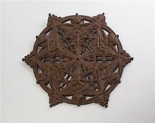 A Cast Iron Elevator Grill Medallion, after the Louis Sullivan example for the Guaranty Building, Diameter 11 1/4 inches.
