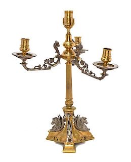 A Louis XVI Style Gilt and Silvered Bronze Four-Light Candelabrum, Height overall 21 inches.