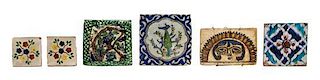 Nine Middle Eastern Style Pottery Tiles, Height of largest 12 1/4 x width 9 inches.