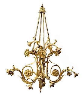 A Neoclassical Style Gilt Bronze Twelve-Light Chandelier, Height 42 x diameter 35 inches.