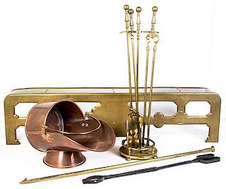 * A Collection of Brass Fireplace Equipment, Height of tallest 28 1/2 inches.