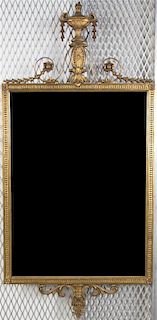 * An Adam Style Giltwood Mirror, Height 49 x width 23 3/4 inches.