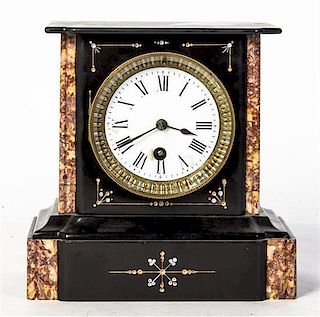 * A Victorian Slate Mantel Clock, Height 7 3/4 inches.