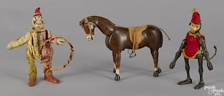 Three Schoenhut painted wood figures, to include a horse with glass eyes, 9 1/2'' l.