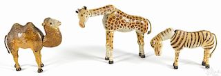 Three Schoenhut painted wood animals with glass eyes, to include a giraffe, 10 1/2'' h.