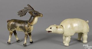 Two Schoenhut painted wood animals with glass eyes, to include a polar bear and a reindeer, 8'' l.