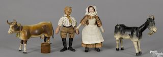 Schoenhut painted wood farmer group, to include a farmer, a milkmaid with a two-part head