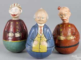 Three Schoenhut composition rolly dollys, to include a jockey nodder, 9 1/2'' h., a Foxy Grandpa