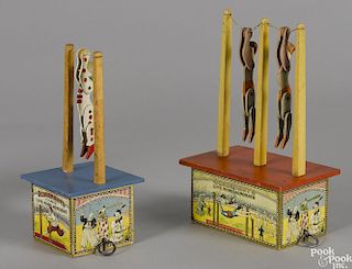 Two Schoenhut Live Wire Acrobats articulated wood figures on wooden platforms