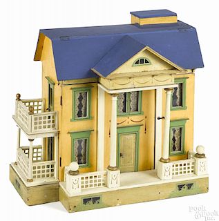 Gottschalk blue roof doll house with an elevator, with original papers, 20'' h., 20'' w.