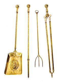 * A Set of English Brass Fireplace Tools, Length of longest 28 1/2 inches.