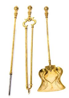 * A Set of English Brass Fireplace Tools, Length of longest 29 inches.