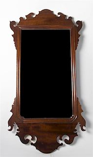 A Chippendale Style Mahogany Mirror, Height 37 1/2 x width 19 1/2 inches.