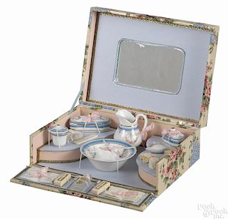 French doll's toilette set in a presentation box, complete with a wash bowl, a pitcher, combs