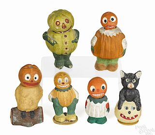Six German composition Halloween candy containers, to include a pumpkin head owl