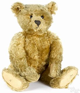 Steiff mohair teddy bear, early 20th c., with shoe button eyes and a button in the ear