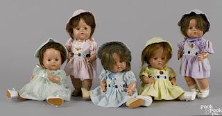 Five Madame Alexander composition Dionne Quintuplets dolls with sleep eyes and jointed bodies