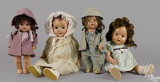 Four Madame Alexander composition Dionne Quintuplets dolls with sleep eyes and jointed bodies