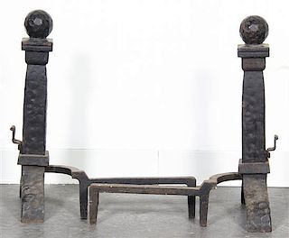 A Pair of Arts and Crafts Style Wrought Iron Andirons, Height 21 inches.