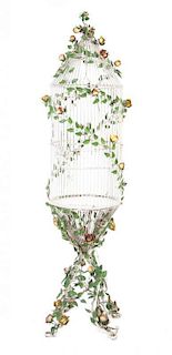 * A Victorian Polychrome Metal Birdcage, Height 60 inches.