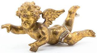 A Continental Gilt and Silvered Wood Figure of a Putto, Width 10 inches.