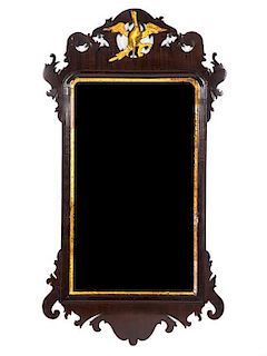 A George II Parcel Gilt Mahogany Mirror, MID-18TH CENTURY, Height 38 1/4 x width 20 1/2 inches.