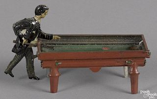 George Kellerman tin lithograph mechanical billiards player penny toy, 4'' w.
