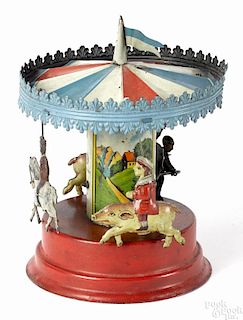 Gunthermann tin lithograph and hand painted musical clockwork carousel with children riding pigs