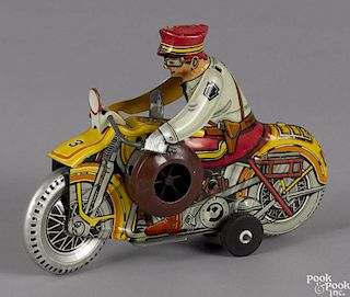 Marx tin lithograph wind-up police motorcycle with a siren, 8 1/4'' l.