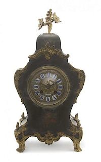 A German Cream Painted and Gilt Bronze Mounted Clock, GOTTFRIED DOHMAN, DUSSELDORF, Height 15 3/4 inches.