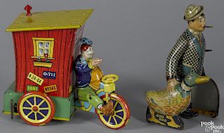 Two tin lithograph wind-up toys, to include a Wyandotte Humphrey Mobile, 7'' h.