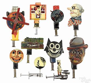 Ten tin lithograph plunger toys, to include a Felix the Cat thaumatrope, an airplane, a train