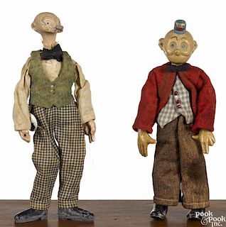 Two Swiss Bucherer metal ball jointed comic Saba figures, in their original outfits