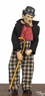 Swiss Bucherer metal ball jointed Charlie Chaplin Saba figure, in original outfit, with a cane