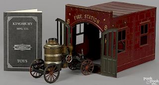 Kingsbury pressed steel Fire Station no. 8 and wind-up fire pumper, station - 10'' h., 8 3/4'' w.