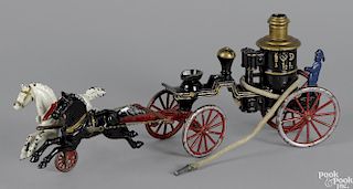 Cast iron horse drawn fire pumper, overall - 19'' l.