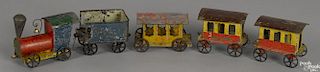 Early American painted tin Clipper five-piece floor train set, engine - 5'' l.