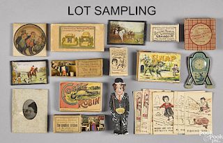 Thirty-nine miniature souvenir penny toys from Universal Theatres Concession Co., Chicago
