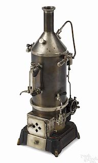 Doll et Cie vertical steam engine, tin boiler with a cast iron base, embossed D & C